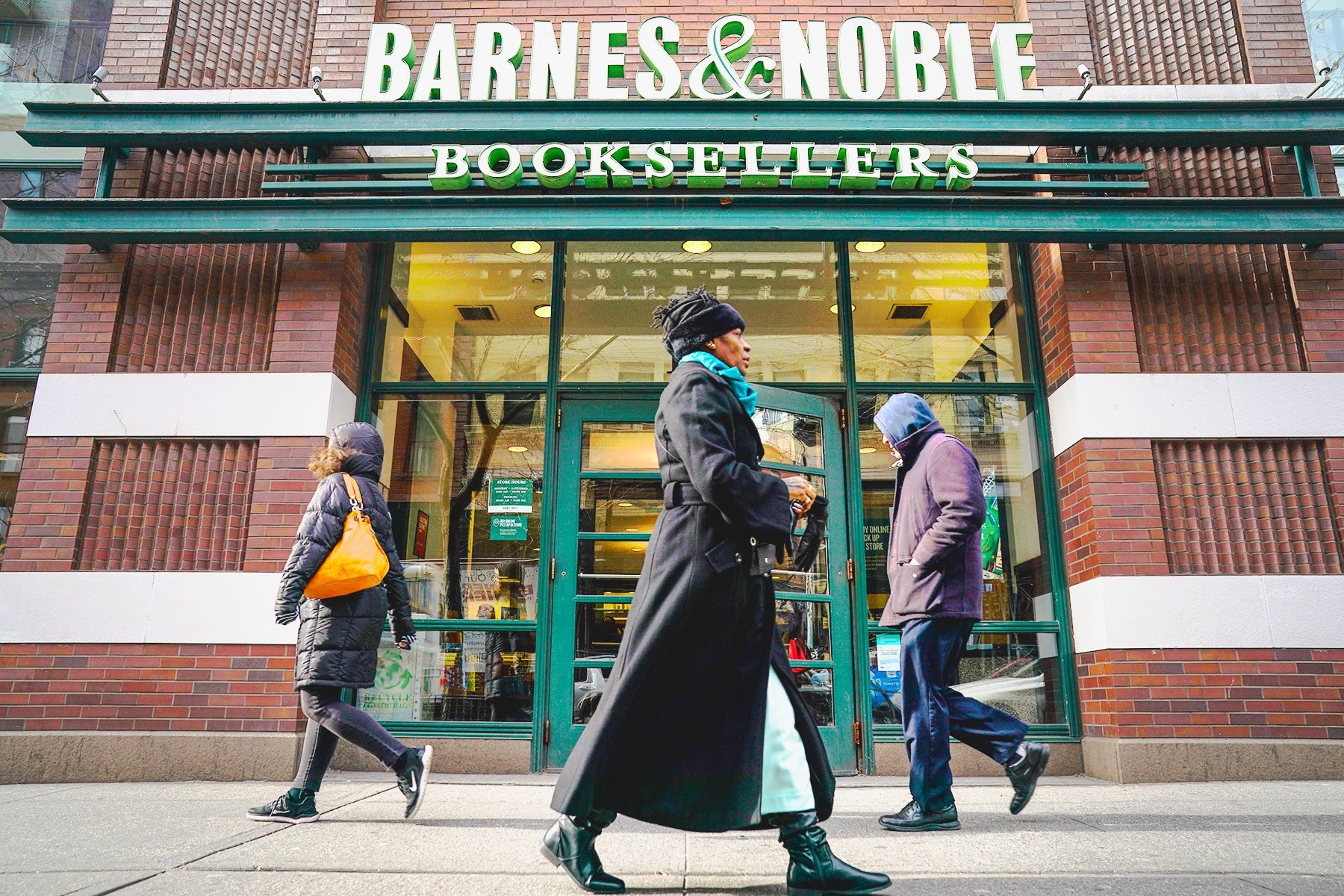 People Walk By a Barnes & Noble Bookstore