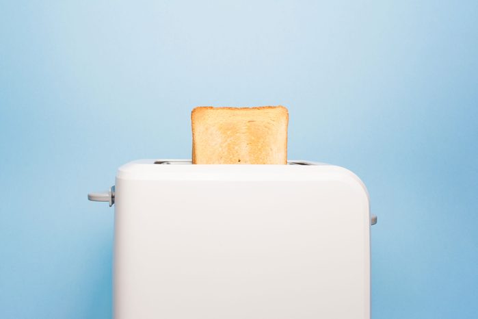 toast popping out of a toaster