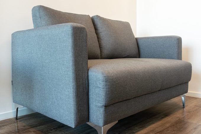A grey microfiber sofa