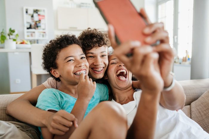 Single Mom Having Fun With Her Sons Taking Selfies