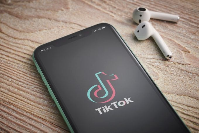Apple iPhone 11 with Tiktok Video Sharing App Loading up on the Screen