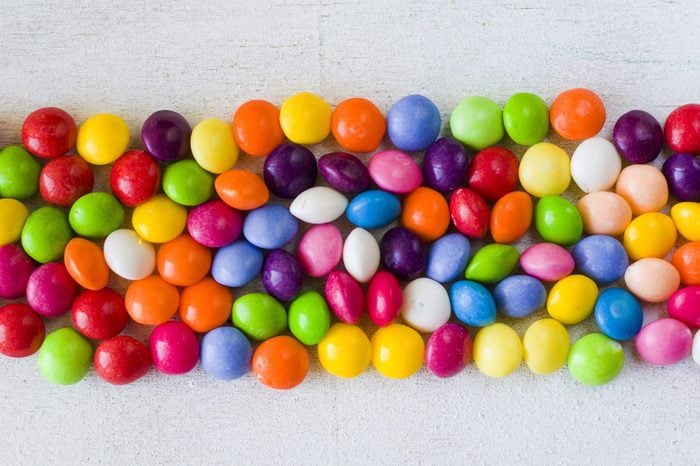 Skittles candy on the table, colorful sweet candy background