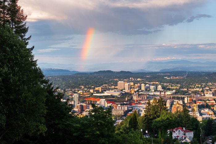 Portland, Oregon, USA downtown cityscape with a Rainbow