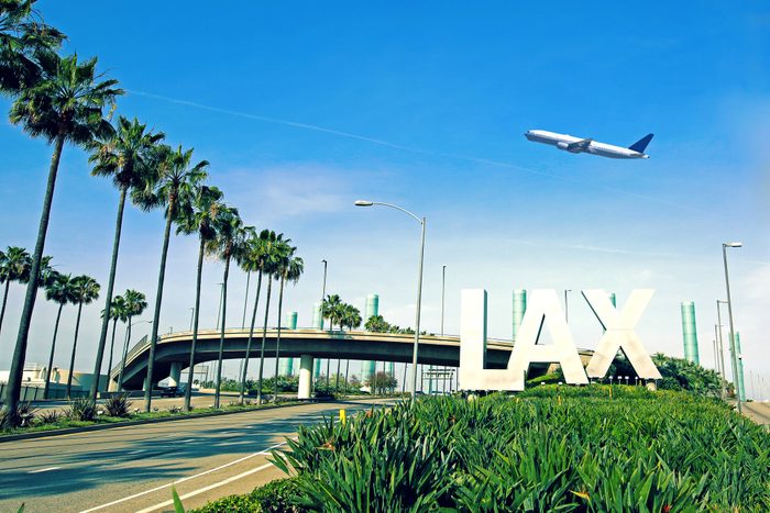 Los Angeles Airport LAX with airplane flying overhead