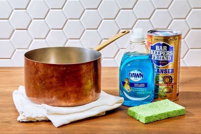 How To Clean And Polish Copper with soap and mild commercial acid