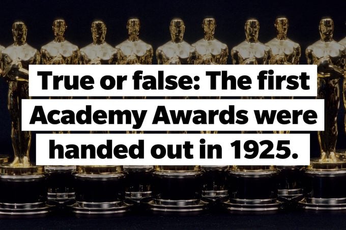 Oscar statues lined up, TEXT: True or false: The first Academy Awards were handed out in 1925.