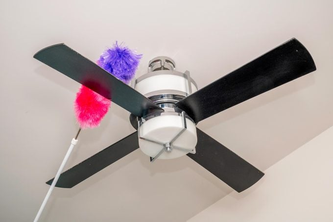 dusting a ceiling fan