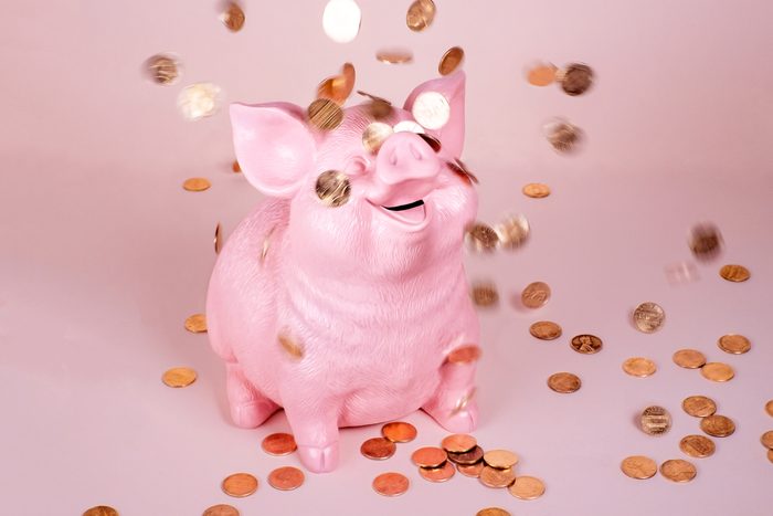 Piggy Coin Bank with falling pennies