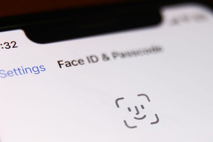 Face ID icon displayed on a phone screen is seen in this illustration photo taken in Krakow, Poland