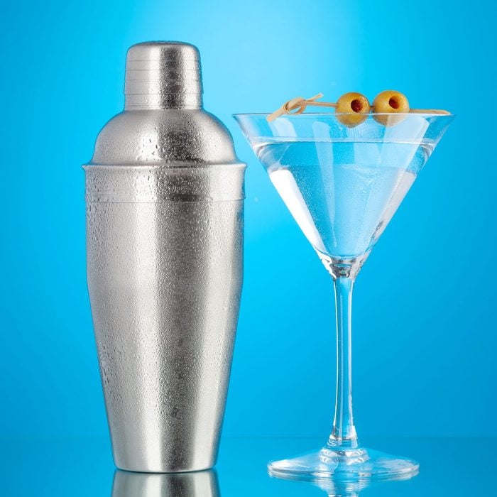 Cocktail shaker and martini cocktail
