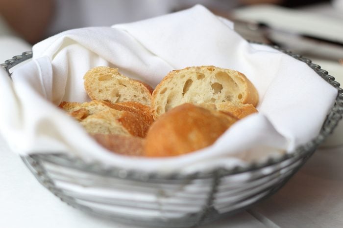 Bread in basket on restaurant table