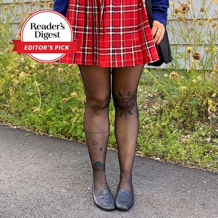 legs wearing Sheertex Tights and a red plaid skirt
