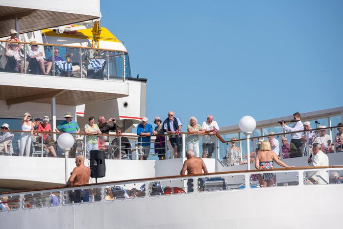 view of a cruise deck with many guests outside