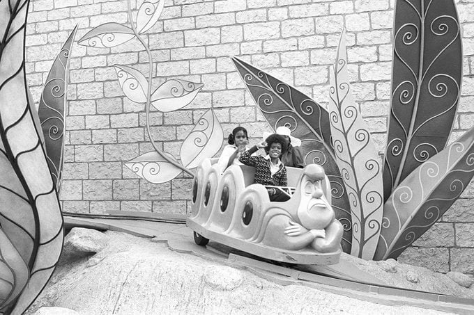 Foster Sylvers and Patricia Lynn Sylvers future members of the R and B group The Sylvers on the Alice In Wonderland ride at Disneyland on September 15, 1973