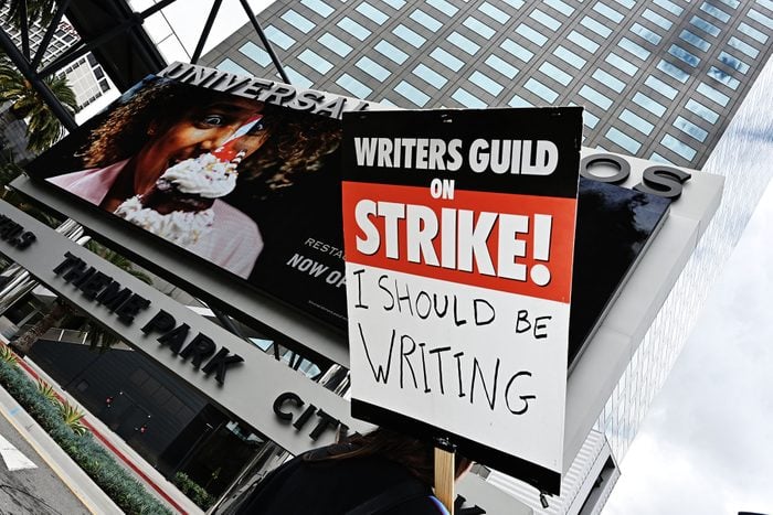 Protestors and members of the Writers Guild of America (WGA) picket outside of Universal Studios on May 5, 2023 in Los Angeles, California