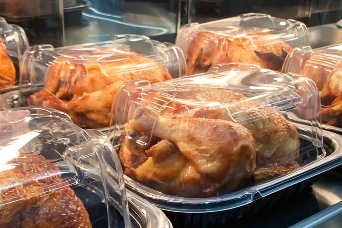 Packed Rotisserie Chicken Place On The Shelf waiting to be sold in the grocery store deli section