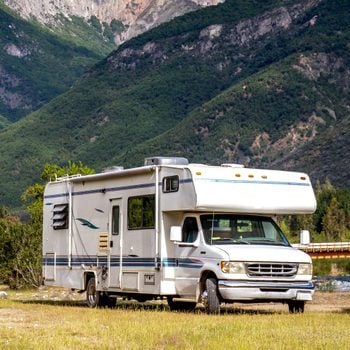 RV parked with beautiful mountain landscape in the background