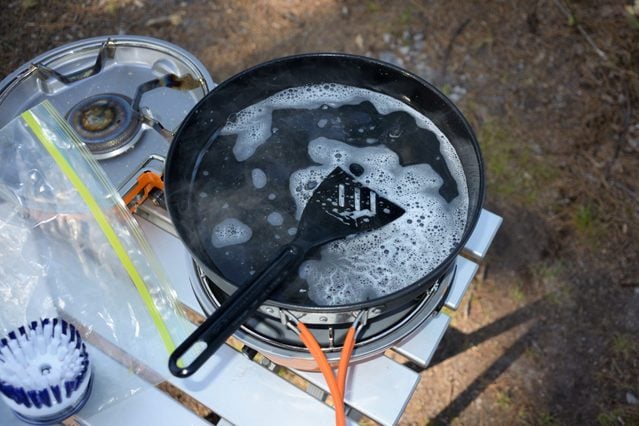 Cleaning the camp stove