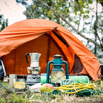 orange tent and camping supplies