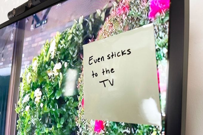 Reusable Sticky Note stuck on a tv screen
