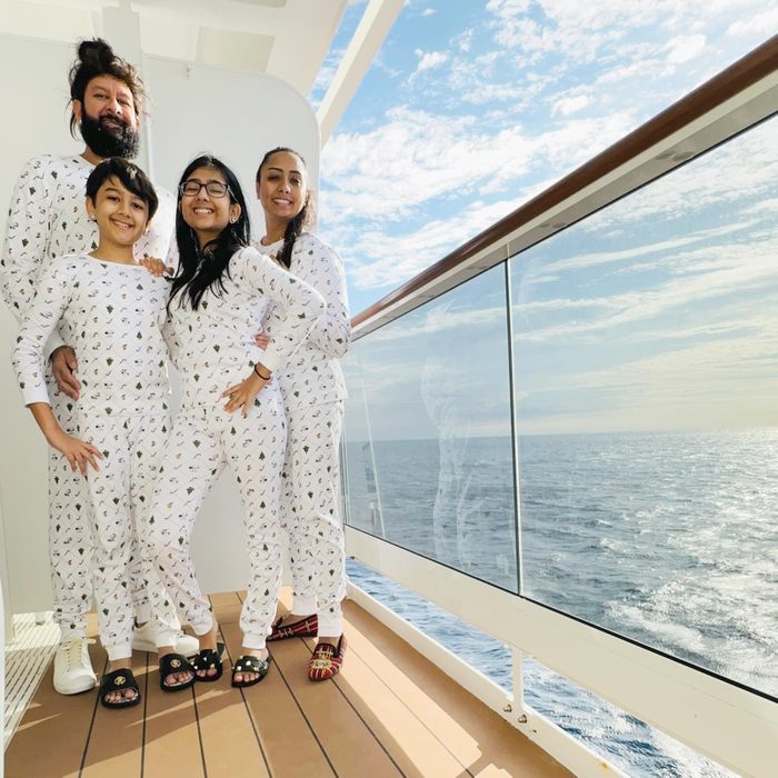 family of 5 in matching pajamas on a cruise