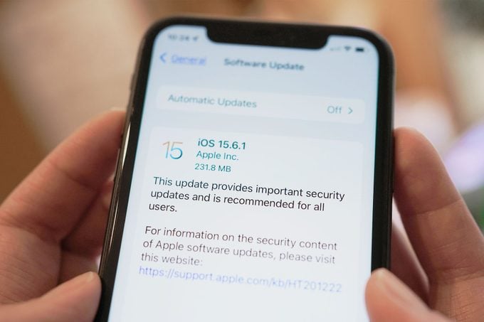 A message notifying users of an important security update is displayed on an iPhone 11