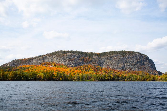 Mount Kineo at Moosehead Lake Maine during Fall foliage season shot from from the water