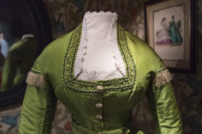 arsenic green victorian dress in a museum
