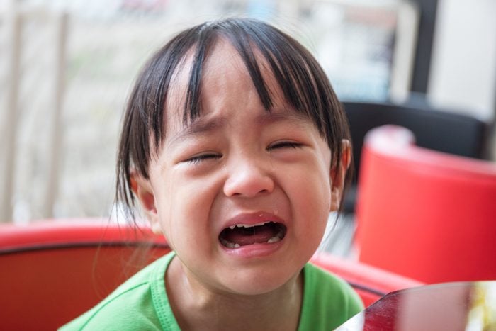 Crying Asian Chinese little girl
