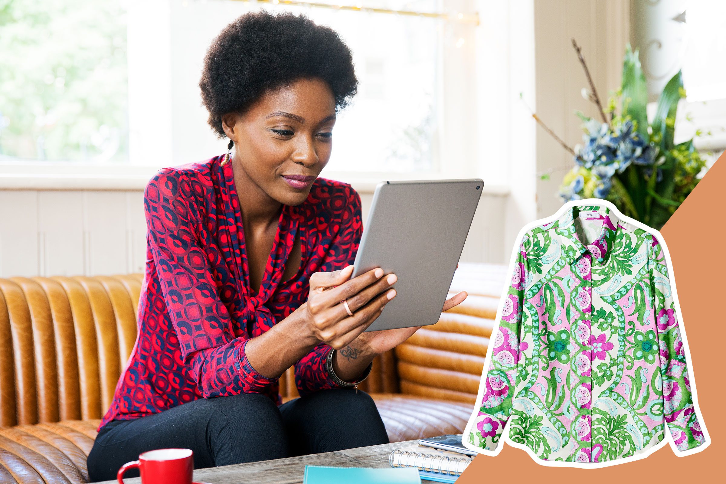 woman using a tablet wearing a patterned shirt