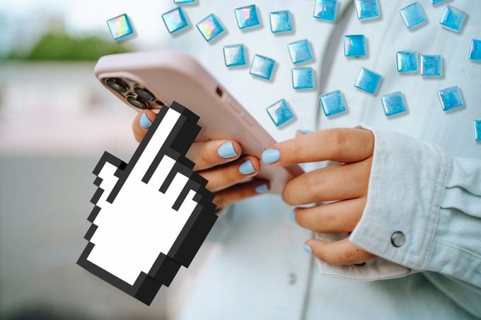 close up of hands using smartphone; over image are blue tiles and giant cursor hand