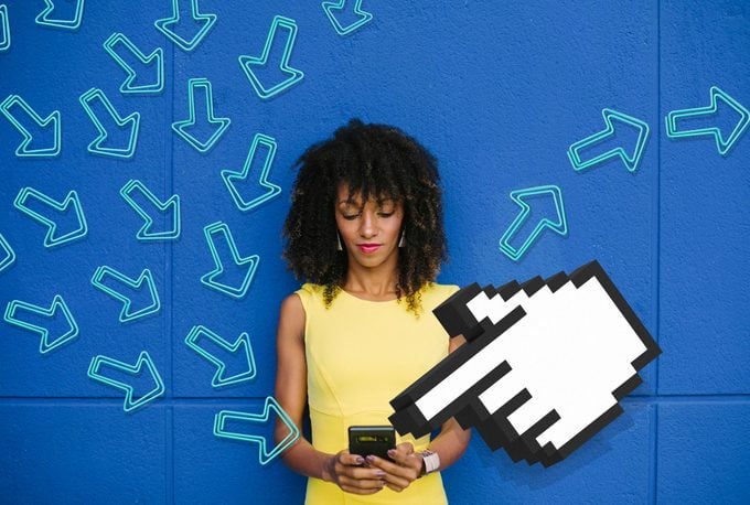 woman using smartphone against blue background; over image is many arrow-shaped paperclips indicating forwarding and sharing and a giant cursor hand
