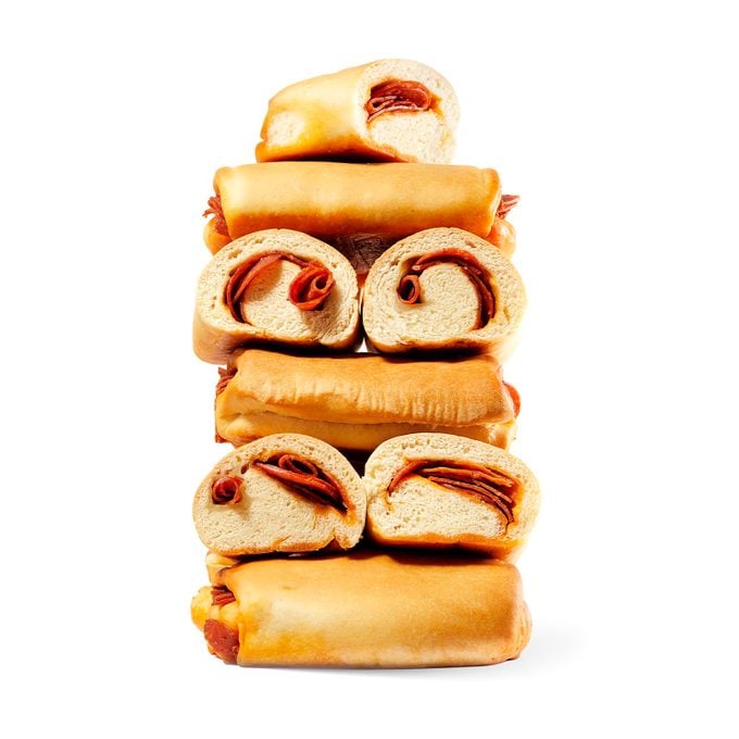 Pepperoni rolls stacked vertically