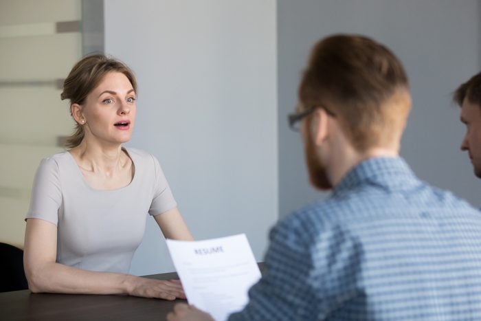 Stressed female applicant feeling surprised or confused at job interview