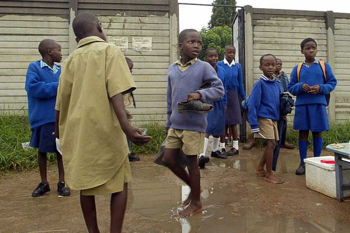 ZIMBABWE school kids outside