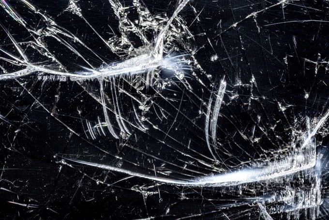 Screen of a mobile phone with broken glass.