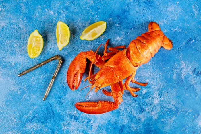 Red lobster with lemon and freshly boiled is a delicious dish to enjoy
