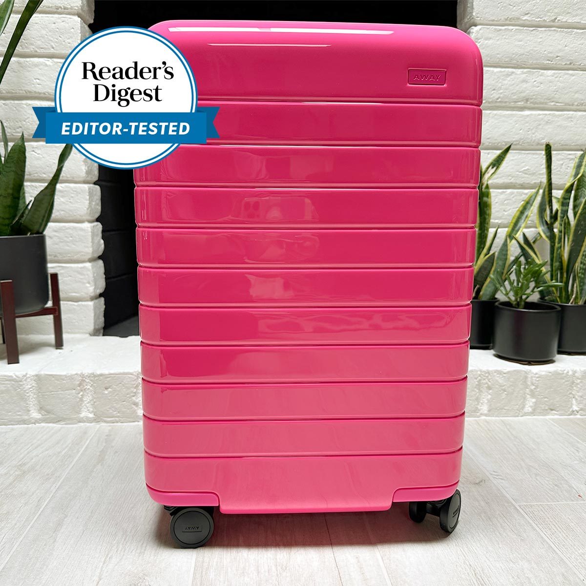 AWAY Bigger Carry-On Suitcase  Bigger & optional phone charger