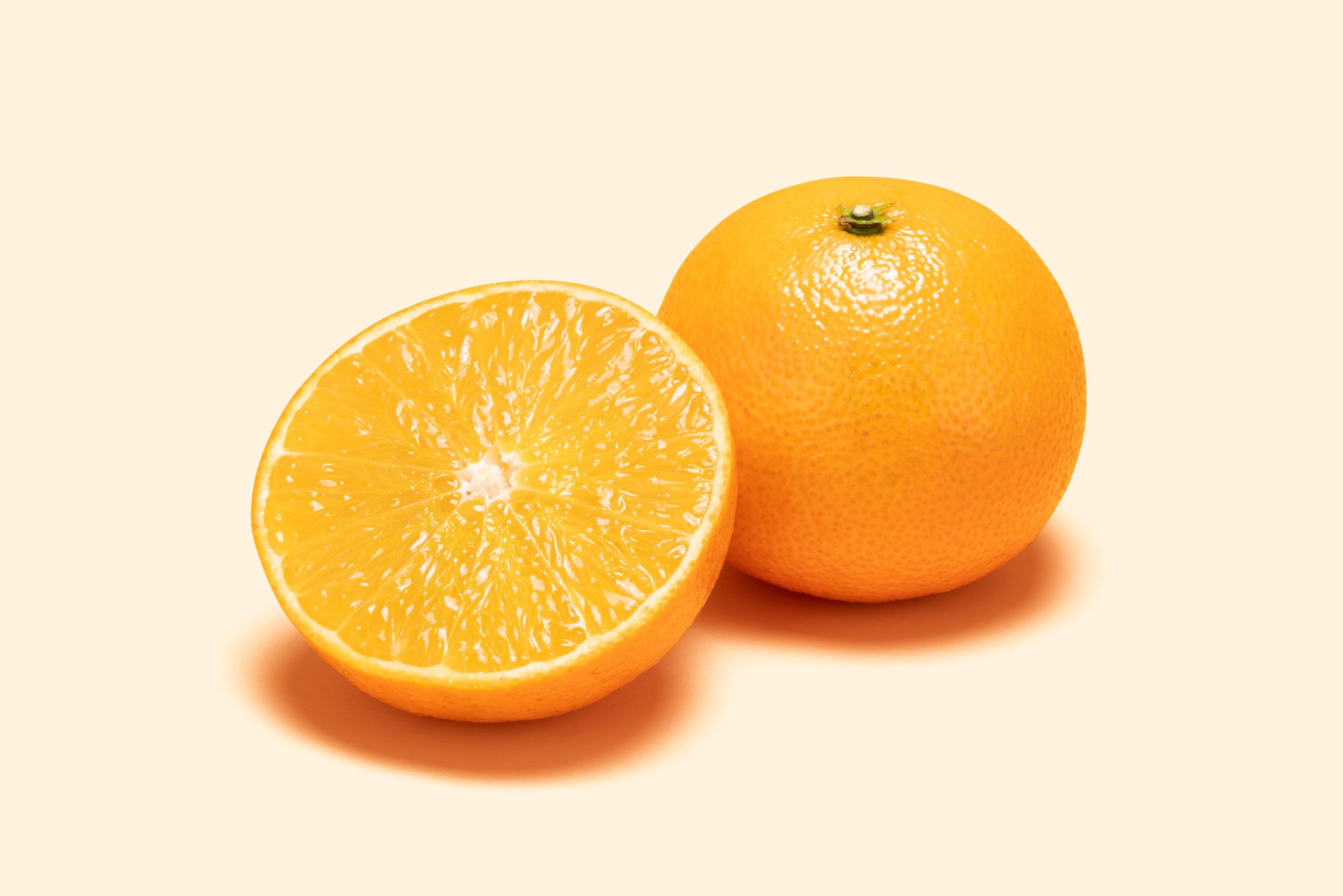Orange and Cross Section on Colored Background