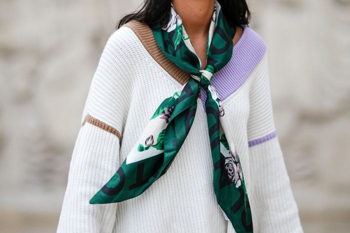 fashionable anonymous women wearing a silk scarf