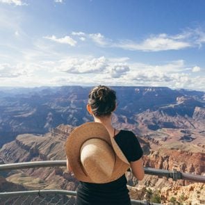Woman looking over the Grand Canyon