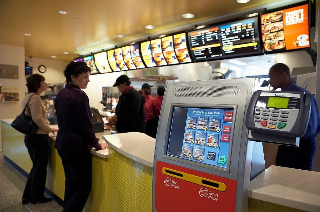 McDonald's is testing new ordering kiosks at a working restaurant at the company's Oak Brook, Illinois headquarters.