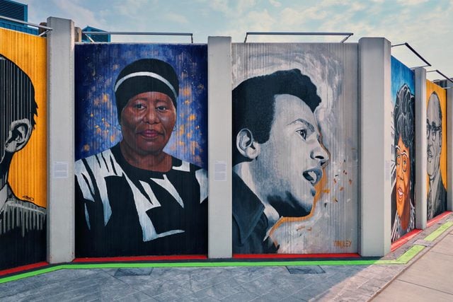Eva Doyle and Huey P. Newton are among 28 civil rights leaders on Buffalos Freedom Wall mural.