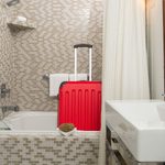 Here’s Why You Should Put Luggage in Your Hotel Room’s Bathtub, According to Experts