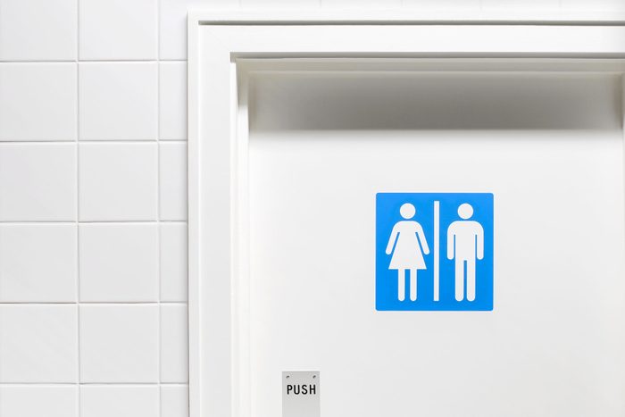 Female And Male Sign On Toilet Door, Close Up