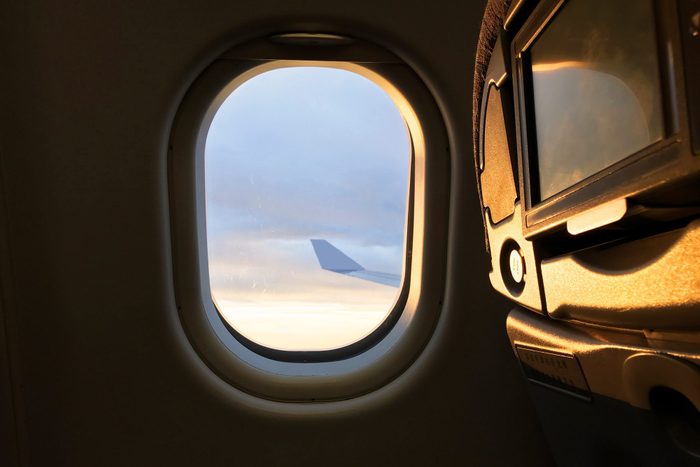 Sunlight from the porthole on airplane