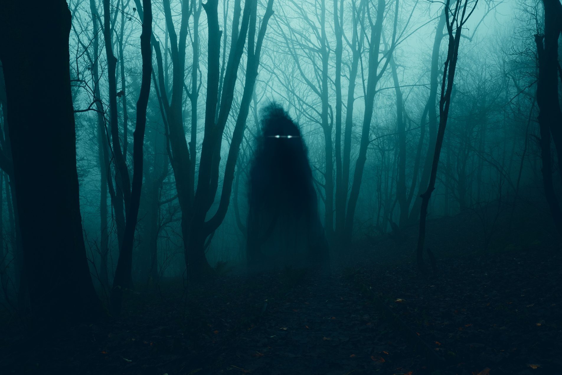 A supernatural concept. Of a ghost with glowing eyes floating above the ground . In a spooky, winter forest at night