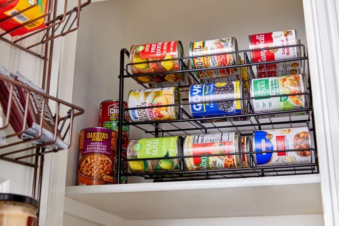 soup can organizer in a pantry