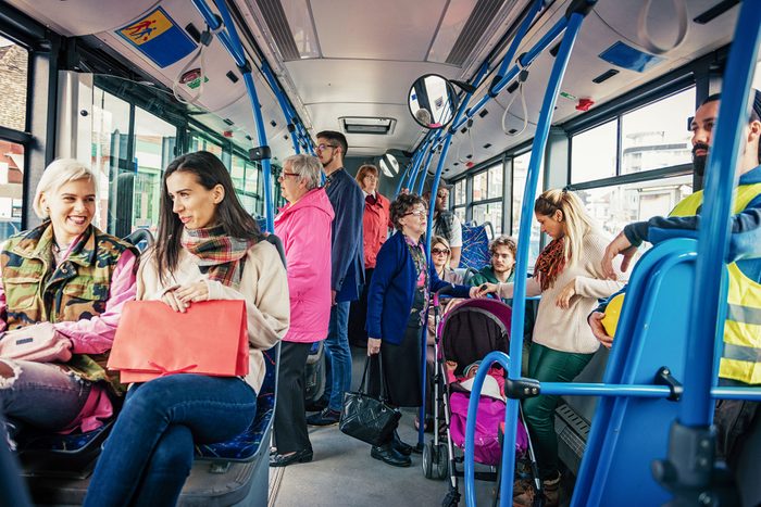 Youth, Adults And Seniors Traveling By Public Bus