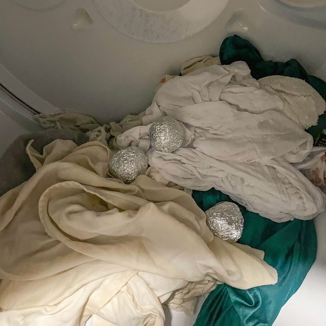 Toss your foil ball into the dryer